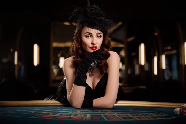 A glamorous woman holding casino chips in a neon-lit environment, representing the premium online casino atmosphere of LUCK789.