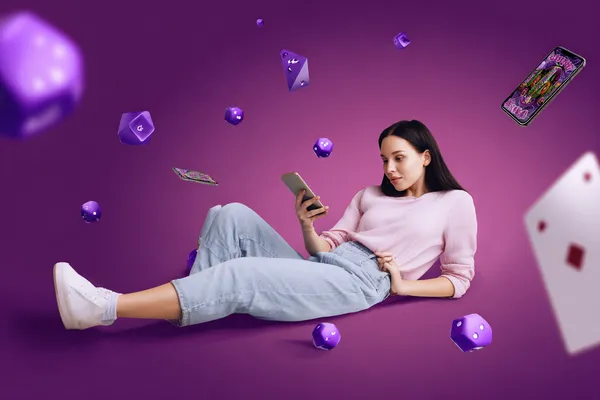 A woman smiling by bright slot machines showing lucky symbols, showcasing the exciting slot offerings at LUCK789.
